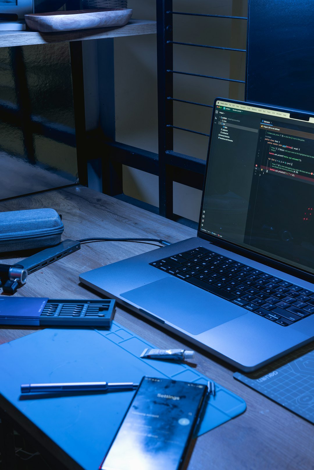 Developer using a laptop for AI coding and software development